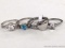 Sterling silver and two other rings. Bright sterling silver ladies ring with clear stones is marked