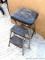 Cosco folding step stool is 2' tall.