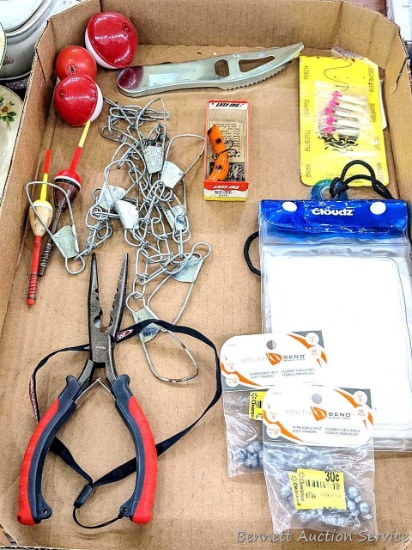 Fishing supplies including stringer, sinkers, pliers, bobbers, scaler, valuable case, more.