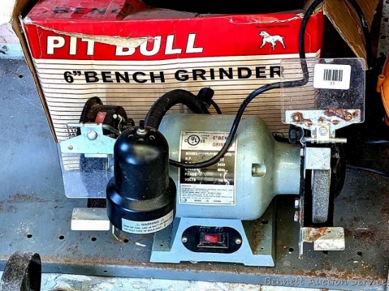 Pit Bull 6" bench grinder with original box, works and still has shields and light.