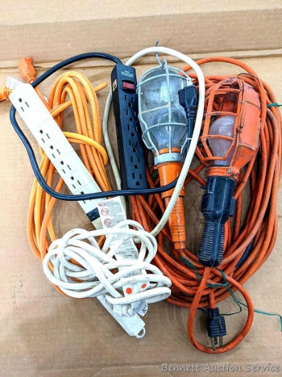 Several extension cords and power strips and work lights.