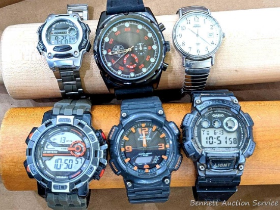 Men's watches by Timex, Armitron, Casio and others. Widest face is approx. 2".