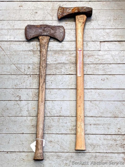Double bit axe and a splitting maul. Axe head is 9-1/4" wide; splitting maul head is 8-1/2".