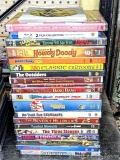 Twenty-five DVDs including The Three Stooges, Chitty Chitty Bang Bang, The Best of Howdy Doody,