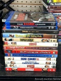 Thirteen DVDs including Jumanji, American Wedding, Spider-Man, Dumb and Dumber To, Daddy's Home,
