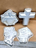 Wilton and other decorative cake tins incl SpongeBob, Tigger, and Superman. Cross is 15-1/4