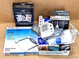 Blood pressure cuff, extra long heating pad, foldable LED mirror, bathroom scale, Colgate