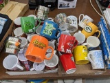 A good collection of giant mugs, tall mugs and licensed mugs incl Star Wars, Reese's, Peanuts and
