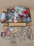 A plethora of cookie cutters for your favorite baker, a Mirro cookie press and plates and a rolling
