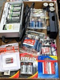 Battery Chargers and various sizes and brands of batteries. Most are unopened in packaging, some