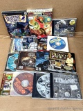 A shoebox tote of PC games with classic titles like Zoo Tycoon, Sim City, Big Game Hunter, Wheel of