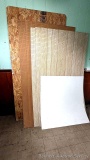 7 pieces of construction material incl 8' piece of OSB particle board with cut corners, 5 sheets of