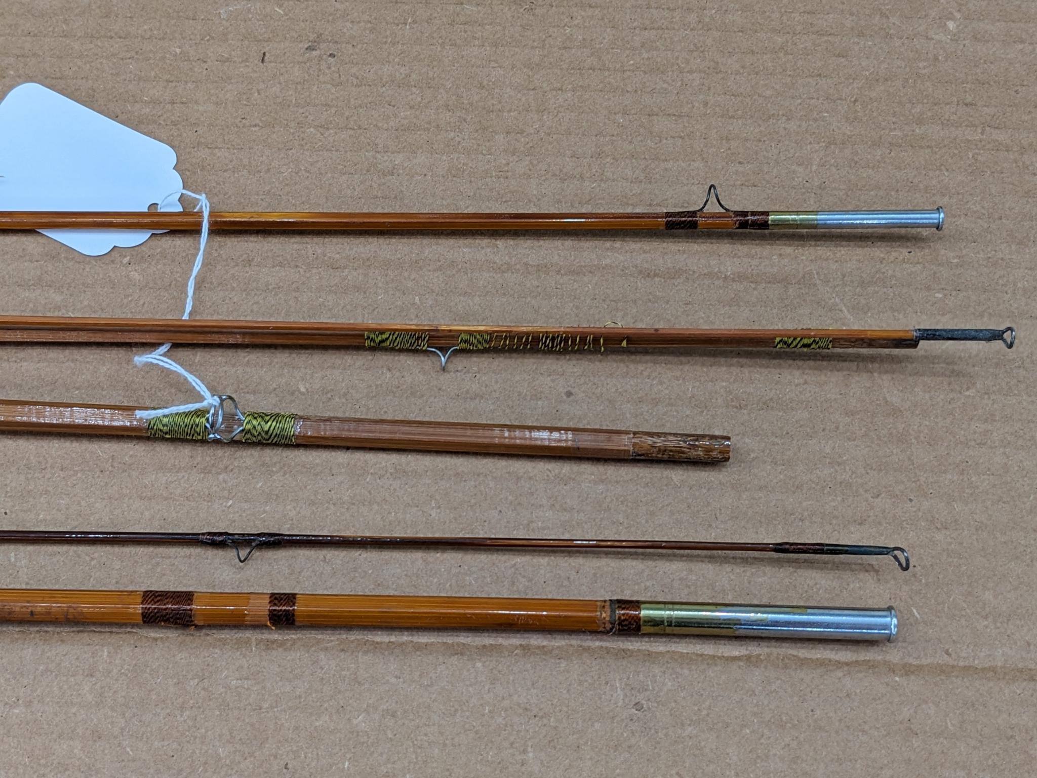 Pair of vintage bamboo fly fishing rods. Some