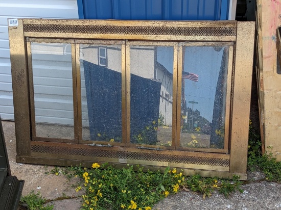 Fireplace front panel with bi-fold glass doors is approx.44" x 28" x 1". Each door is just under