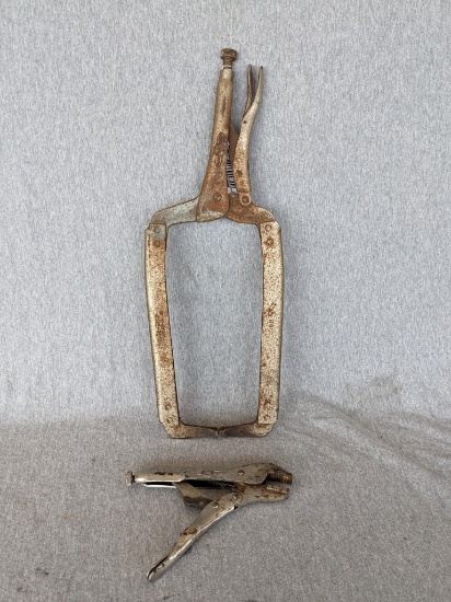 Two pairs of Vise Grip adjustable pliers are about 18" and 7" long overall. Both knobs turn.