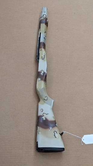 Synthetic M14 / M1A rifle stock with top hand guard, flip up butt plate and cleaning kit door.