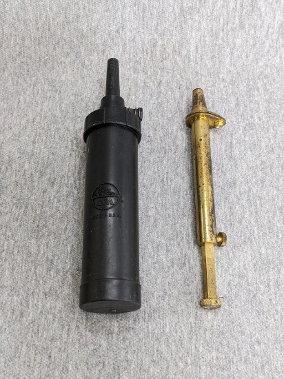 CVA powder dispenser; brass powder measure.