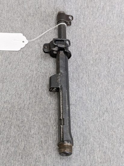 This 10-3/4" barrel is 30 caliber and has a gas block with a short stroke piston on the bottom.
