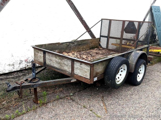 Kesler 8' trailer with flip-down ramp, spare tire, jack. Takes a 2" ball. Bed measures 5' x 8'.