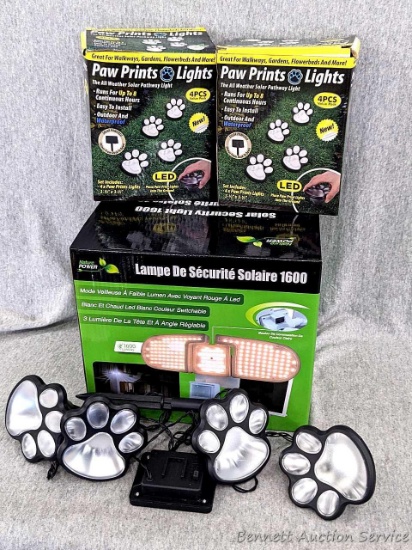 1 Solar Nature Power Security Light 1600 and three sets of 4 Paw Print all-weather solar pathway