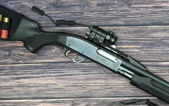 Remington Model 870 Wingmaster Magnum pump action 12 gauge shotgun has a 3" laser, extended