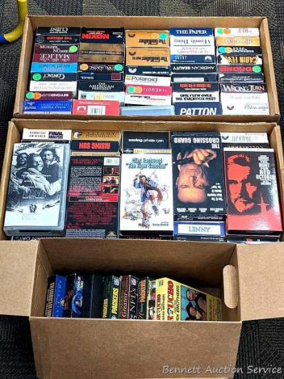 3 boxes of VHS tapes of varying genres for your entertainment! Check out lot #153 too!