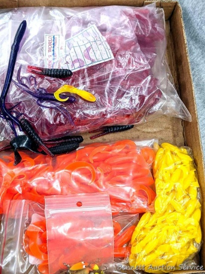 Four bags of jig bodies in different sizes and colors. The largest bag is 6"x8".