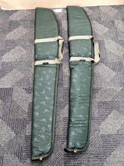 Pair of Mossy Oak Allen soft side firearm cases with carrying handles and zipper. Measure approx 52"