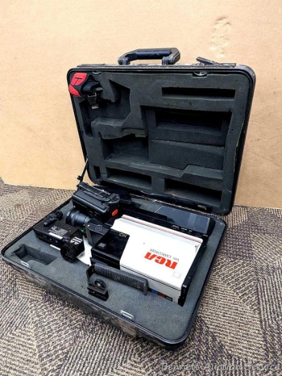 Vintage RCA Camcorder, CMR200, in hard case with 2 battery packs and strap. Hand strap on camera