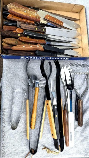 Large variety of kitchen knives, tongs, 8-1/2" meat mallet, potato mashers, meat forks, more. Knives