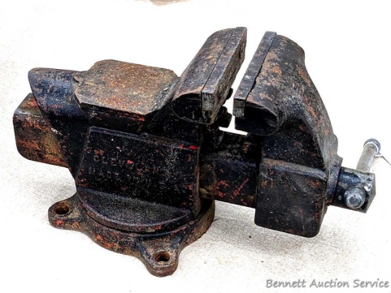 Columbian 4" swiveling bench vice. The vise in in pretty good condition with worn jaws, overall nice