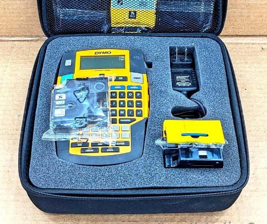 Dymo Rhino 4200 barcode and label printer with a nice cary case and a ton extra labels, a charger,