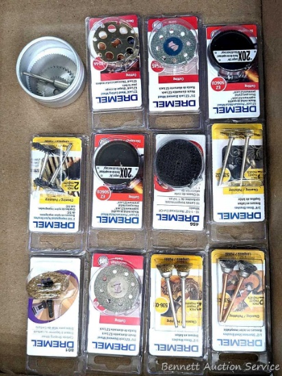 Assorted Dremel brand rotary tool bits incl wood cutting wheel, metal wheels, reinforced cut-off