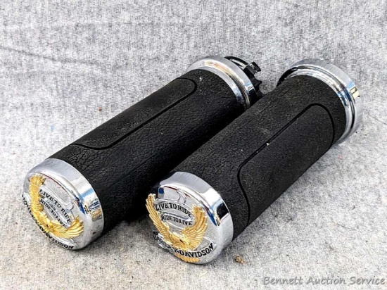Pair of Harley Davidson Motorcycles handlebar grips read on the ends 'Live to Ride, Ride to Live'.