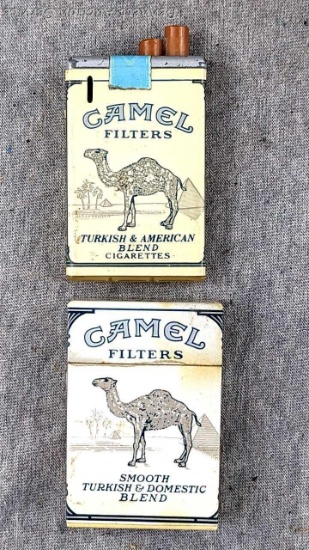 Shouldn't light your Marolboros with these! Two vintage Camel Filters cigarette lighters. Taller
