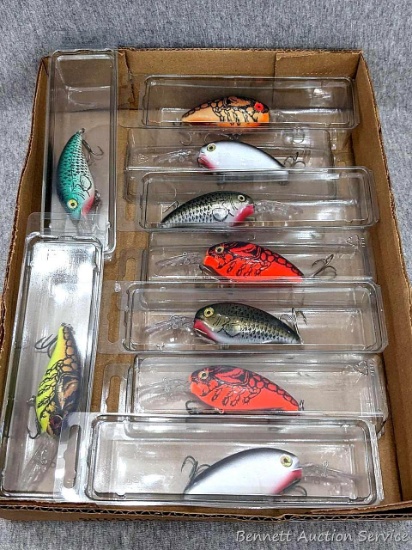 Nine fishing lures are all about 4" long, the one I pulled out of the box rattled. Nice lures.