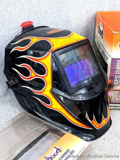 Hobart auto-darkening welding helmet. The welding helmet is in overall good condition with nice head