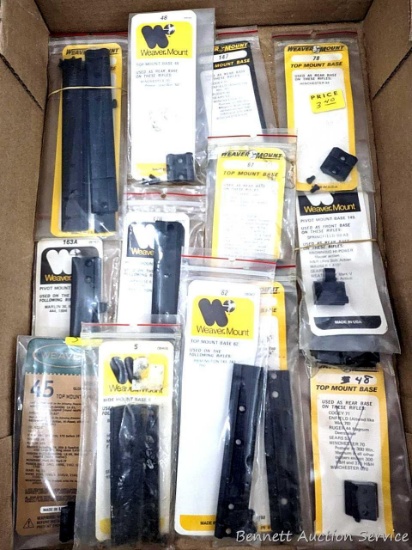 Assorted rifle scope mounts or scope bases.