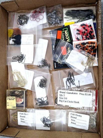Large and small fishing hooks up to about 1-1/2"; plus Rod-N-Bob's after dark fishing bobber