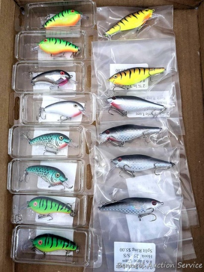 14 hard fishing lures, some or all rattle. Longer about 3" over body and tongue.