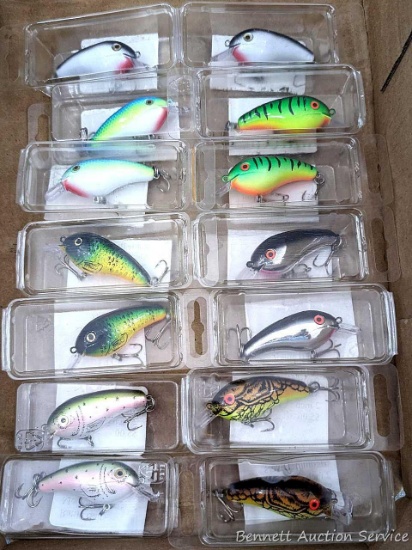 14 hard fishing lures, some or all rattle. All about 2-1/2" over body and tongue.