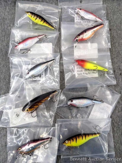 10 hard fishing lures, some rattle. Largest is a rattling Storm about 4-1/4" over body and tongue.
