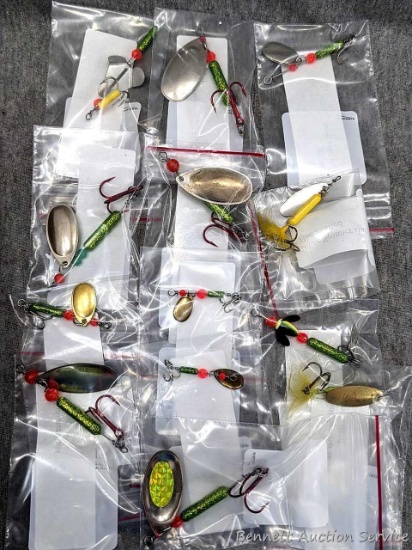 13 inline spinner baits, larger fishing lures around 6" overall.