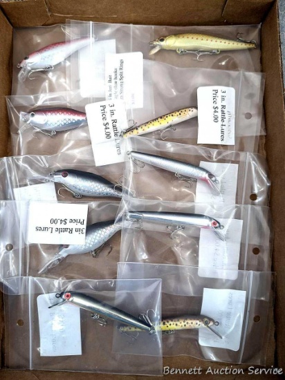 10 hard fishing lures, some or all rattle. Longest nearly 4" over body and tongue.