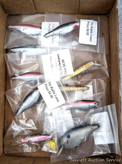 10 hard fishing lures, some or all rattle. Longest nearly 4" over body and tongue.