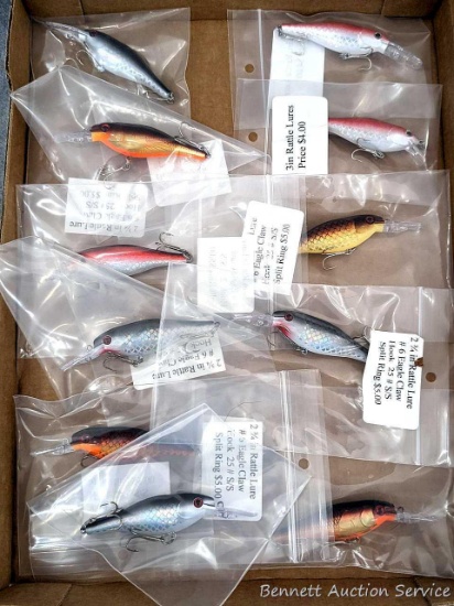 11 hard fishing lures, some or all rattle. Longer about 3-3/4" over body and tongue.
