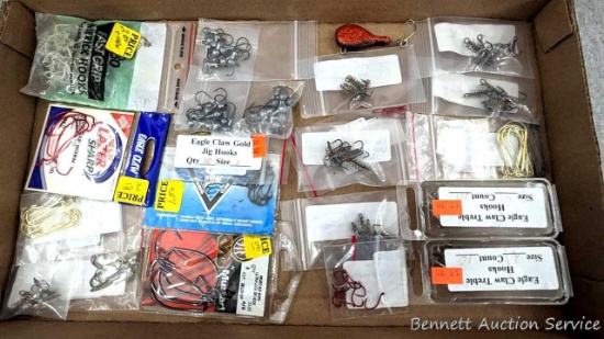 Variety of fish hooks up to about 2-1/4" long incl some springed ones. Brands incl Eagle Claw Lazer