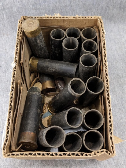 Box of 18 U.S. military unfired primed shotshell hulls are marked US No. 12 Conical Climax US and