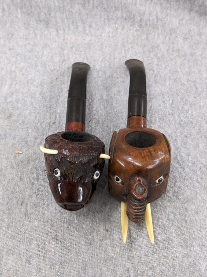 Definite conversation pieces!! Italian-made elephant and water buffalo or bison smoking pipes.