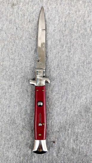 Ships to WI residents only! Switchblade knife measures 9-1/2" open. Blade is Italian style 440
